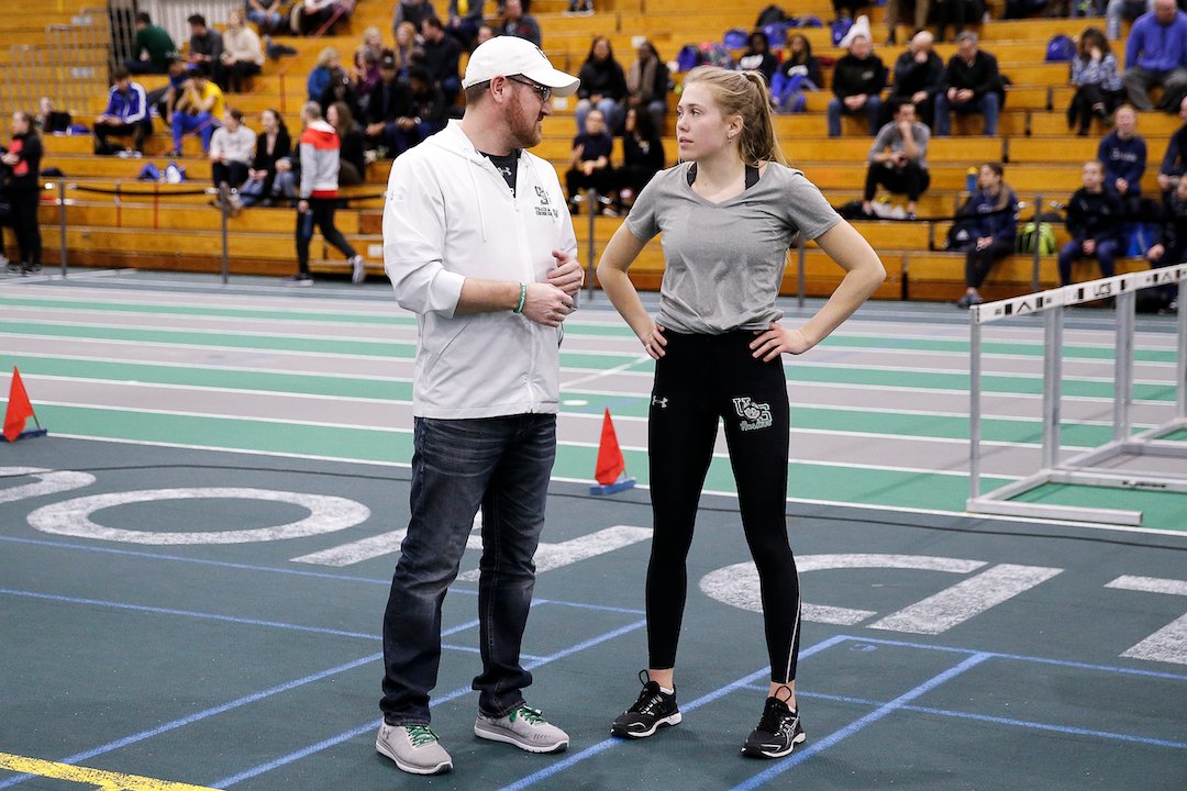 Jason (left) discussing competition plans with Huskie athlete Leadan Chartier.